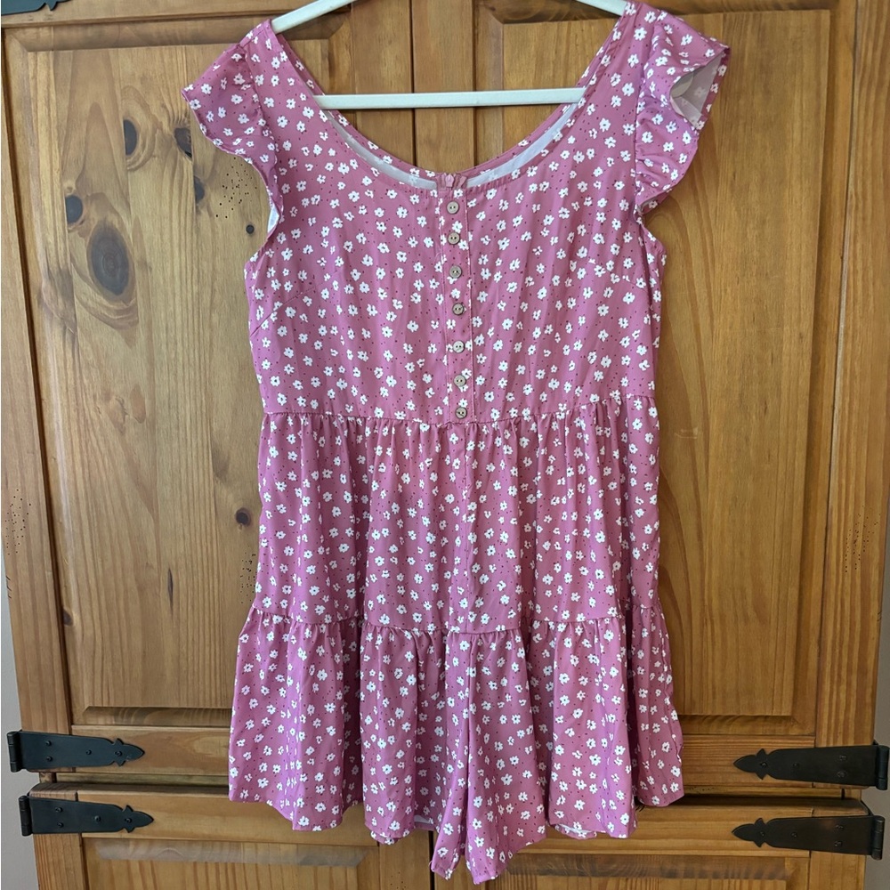 Amazon romper. Pink with white flowers. Size M.